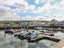 A harbor with boats and buildings at Seaview in Whitehaven