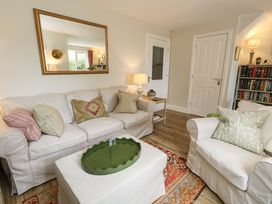 A living room with a sofa and coffee table at 31 Bull Lane Dorchester