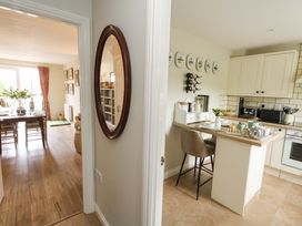 A kitchen with a dining table visible at 31 Bull Lane Dorchester