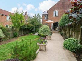 A garden with plants and furniture at 31 Bull Lane in Dorchester