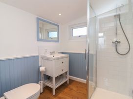 A bathroom with a sink and shower at Stella Maris in Torpoint