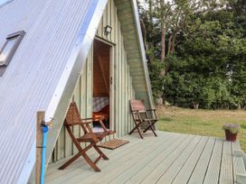 An outdoor space with chairs and a door at Robin in Monewden near Otley, Suffolk