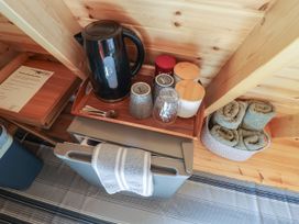 A kitchen area with kettle, mugs and towels at Robin in Monewden near Otley, Suffolk