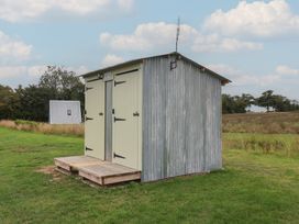 A shed with doors and steps at Robin in Monewden near Otley, Suffolk