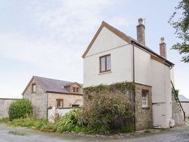 An exterior view of a house and garden at Farrier Cottage Budock Water near Falmouth