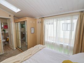 A bathroom with a shower and toilet at Labernum, Lytham St. Annes