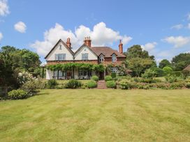 A house with a garden and trees at Uplands House in Ledbury