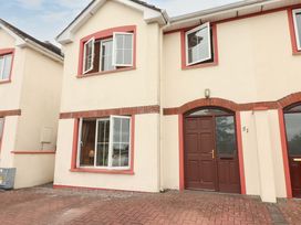 An exterior view of a house with windows and a door at 51 Woodview Park Tralee, County Kerry