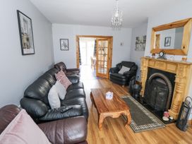 A living room with sofas and a coffee table at 22 White Maples in Bundoran, County Donegal