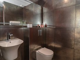 A bathroom with a sink and toilet at Noflash Malpal in Bishop Sutton