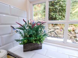 A flower arrangement on a kitchen counter at 5 Hollins Cottages in Whitby
