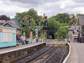 A train station with signals and platform area at 5 Hollins Cottages Whitby