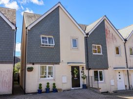 A residential house with a front door and windows at 21 Olympic Way in Plymouth