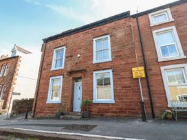 A building with windows and a door at Hampton House in St. Bees