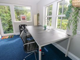 An office with a desk and chairs at Hampton House in St. Bees