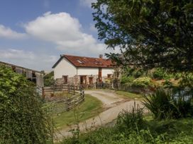 A house with a pathway and garden at Lane End in North Molton