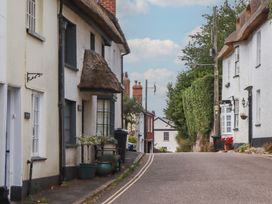 A street with thatched roof houses at Jams in Lympstone