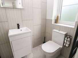 A bathroom with a sink and toilet at Ty Landsker in Milford Haven