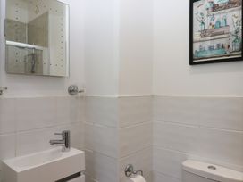 A bathroom with a washbasin and toilet at Littleham Court Manor in Littleham near Bideford