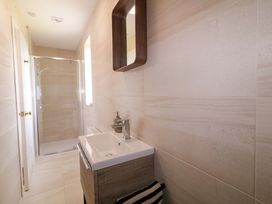 A bathroom with a sink and shower at Ard Na Mara 