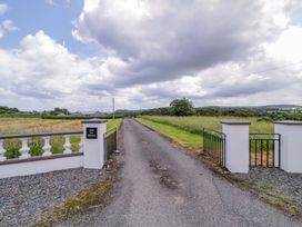 A pathway leading through a gate at Ard Na Mara
