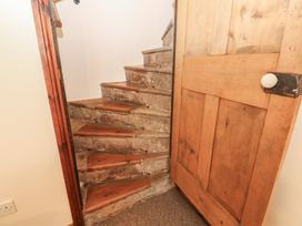 A staircase leading up to another level at Kirkgate Cottage Cockermouth