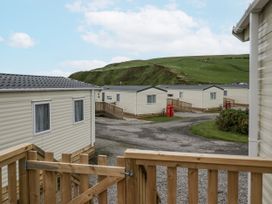 Static caravans and a gravel road at Puffin in St Bees