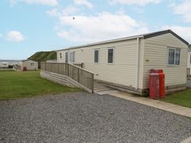 A caravan located near the sea at Sandpiper in St Bees