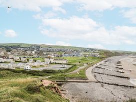 A coastal view with caravans and the sea at Sandpiper St Bees