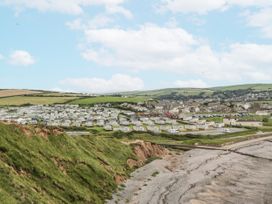 A coastal view with caravans and a beach at Sandpiper, St Bees