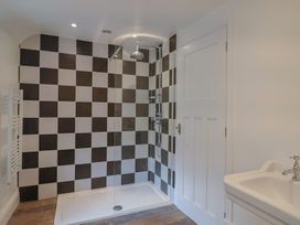 A bathroom with a shower and sink at 46 North Street Stoke-Sub-Hamdon, Somerset