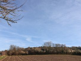 A view of farmland and trees on a hill at 46 North Street Stoke-Sub-Hamdon Somerset