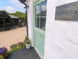 An entrance with a door and nameplate at Lavender Cottage