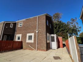 A house with a door and windows at 3 Longstone Park Beadnell