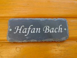 A sign displaying 'Hafan Bach' at Haven in Lloc near Holywell