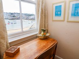 A workspace with a view of the sea at Pelican Cottage in St Ives