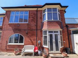 An exterior view of a building with a door and windows at Sandy Shore in Bridlington