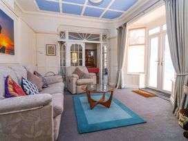 A living room with a sofa and coffee table at Sandy Shore in Bridlington