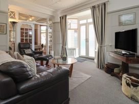 A living room with a sofa and coffee table at Sandy Shore in Bridlington