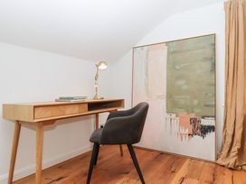 An office with a desk and chair at Tigley Meadow Coach House in Totnes