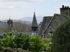A view of stone buildings and rooftops at School Cottage, Troutbeck Bridge near Windermere