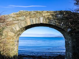 An archway overlooking the sea at Penrhos Walks Holyhead