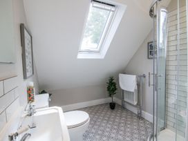 A bathroom with a shower and sink at The Old Vicarage in Kimbolton near Leominster