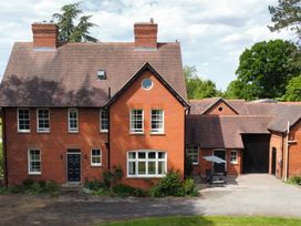 A house with a garage and garden at The Old Vicarage in Kimbolton near Leominster