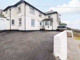A house with a driveway and front steps at Ocean Edge Sennen Cove
