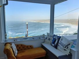 A snug with ocean view at Ocean Edge in Sennen Cove