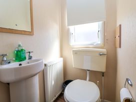 A bathroom with a sink and toilet at Willerby Aurora B14 Towyn