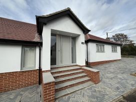 An entrance with steps and windows at Bader House in Ipswich