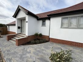 A house exterior with steps and plants at Bader House in Ipswich