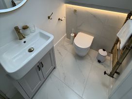 A bathroom with a sink and toilet at Bader House in Ipswich